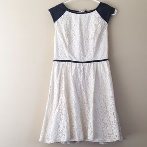 White lace and black leather accent dress